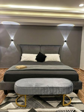 Grey as Smoke -1BHK Modern Condo - Self Checkin